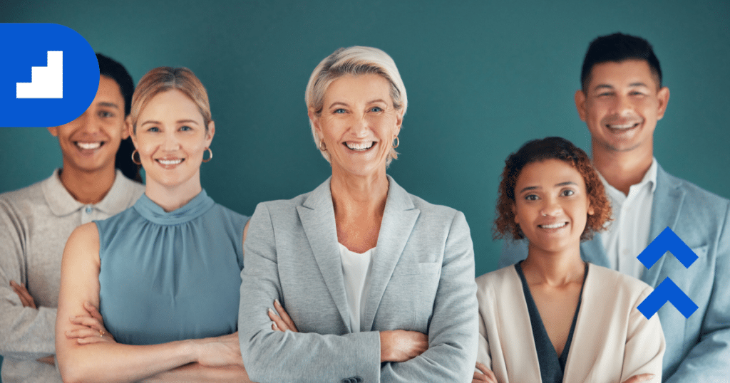 female leader - standing with her team: Female leaders are more likely to recognize and value the contributions of team members, listen actively, and create a safe and supportive work environment.
